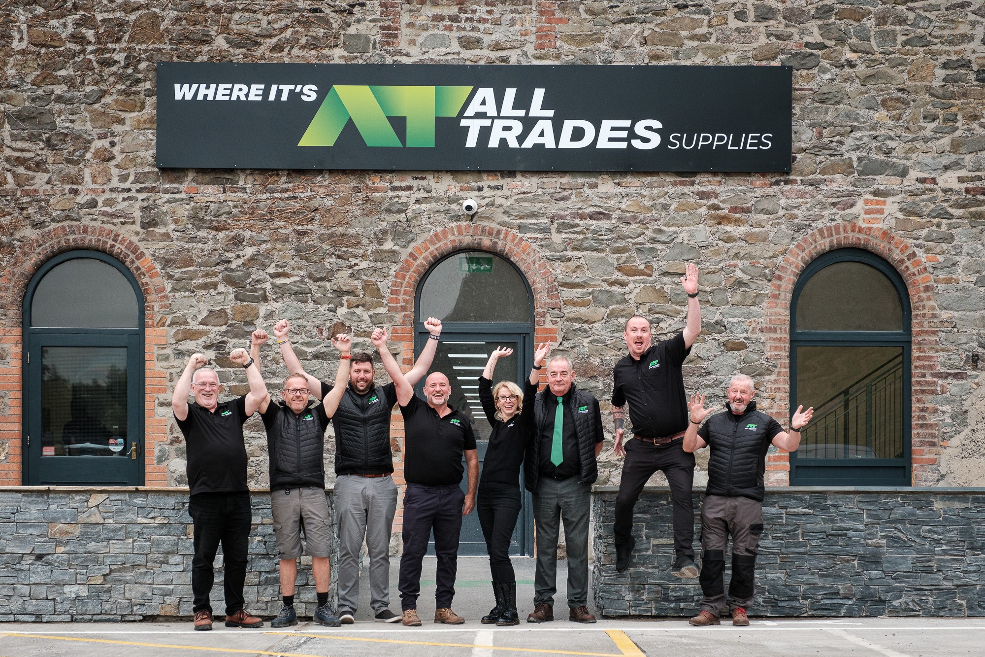 All Trades Supplies team in front of premise.