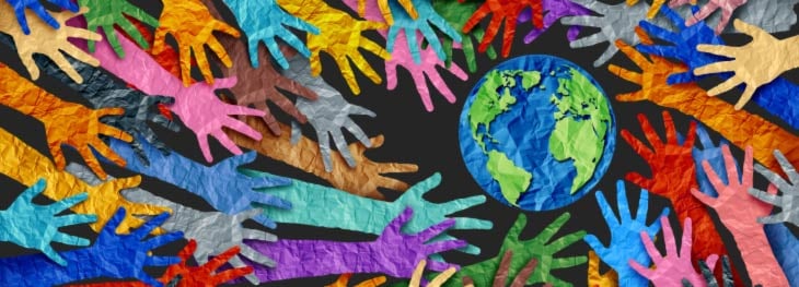 Hands reaching towards the earth as KCS recognises Earth Day.
