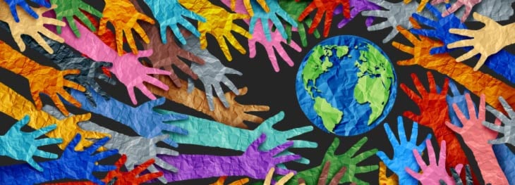 Hands reaching towards the earth as KCS recognises Earth Day.