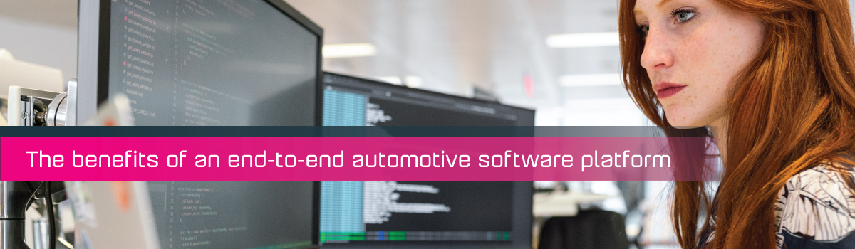 An image with a magenta strap on with copy say The benefits of an end-to-end automotive software platform with a lady working on her desktop.