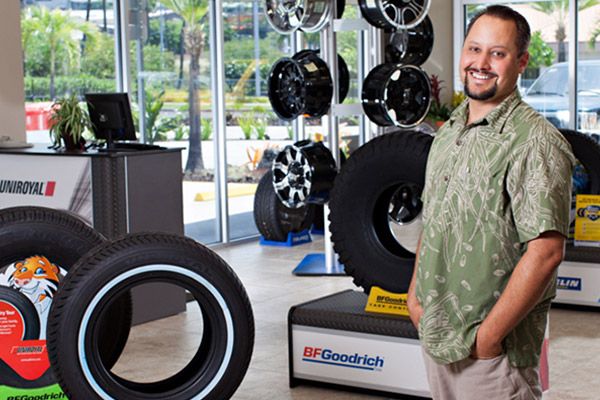 Customer standing in a tire shop